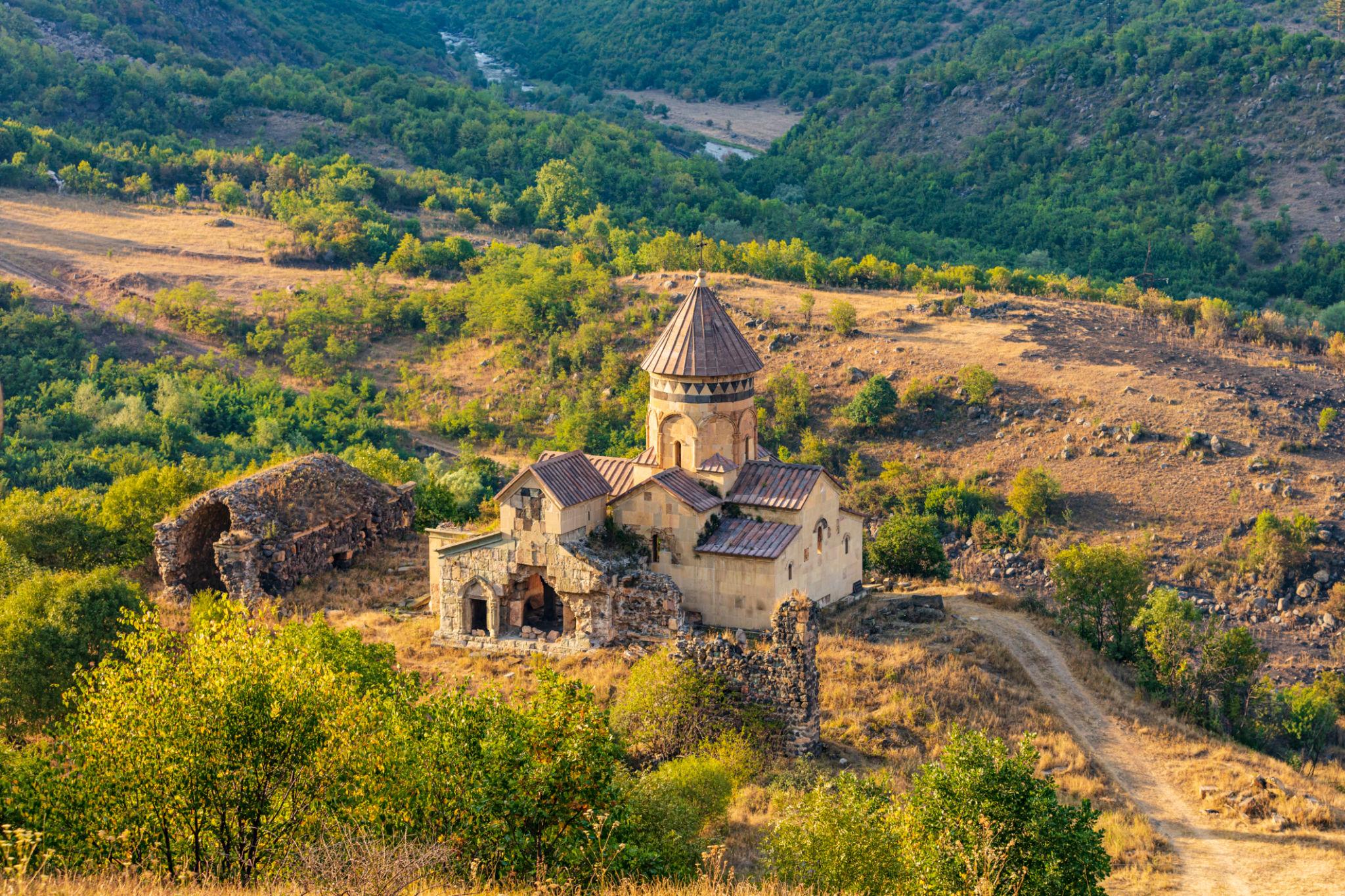 Hnevank Monastery on rocky spur above Dzoraget Gorge in Lori
